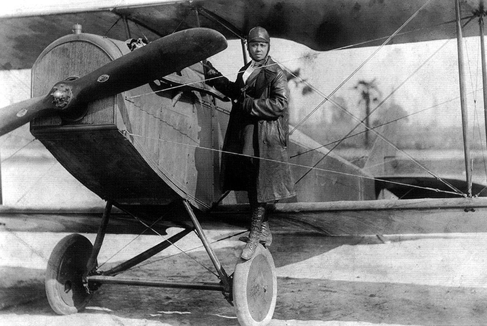 Bessie Coleman and her plane (1922)